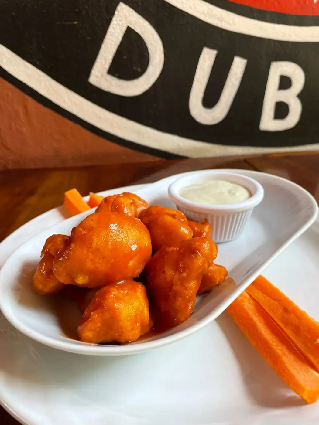 Buffalo wings with ranch and carrot sticks